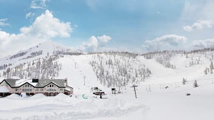 A captivating winter scene at Hoodoo Ski Area in Sisters Oregon showcasing the ski resort lift perfect for winter sports enthusiasts.
