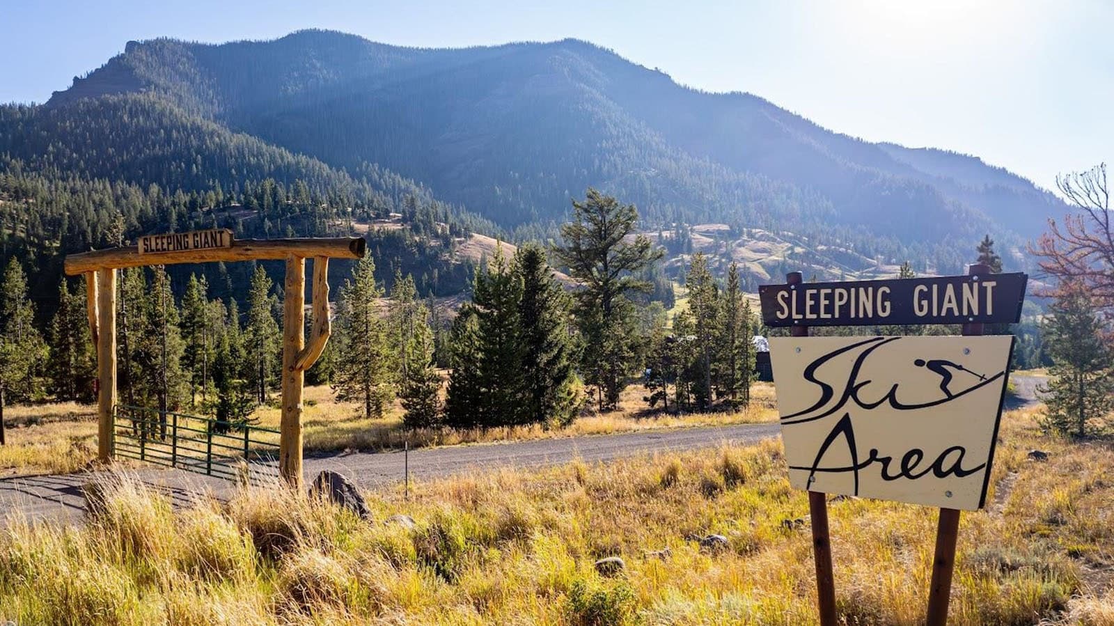 Sleeping Giant in USA - a sign on the side of a road in the mountains.