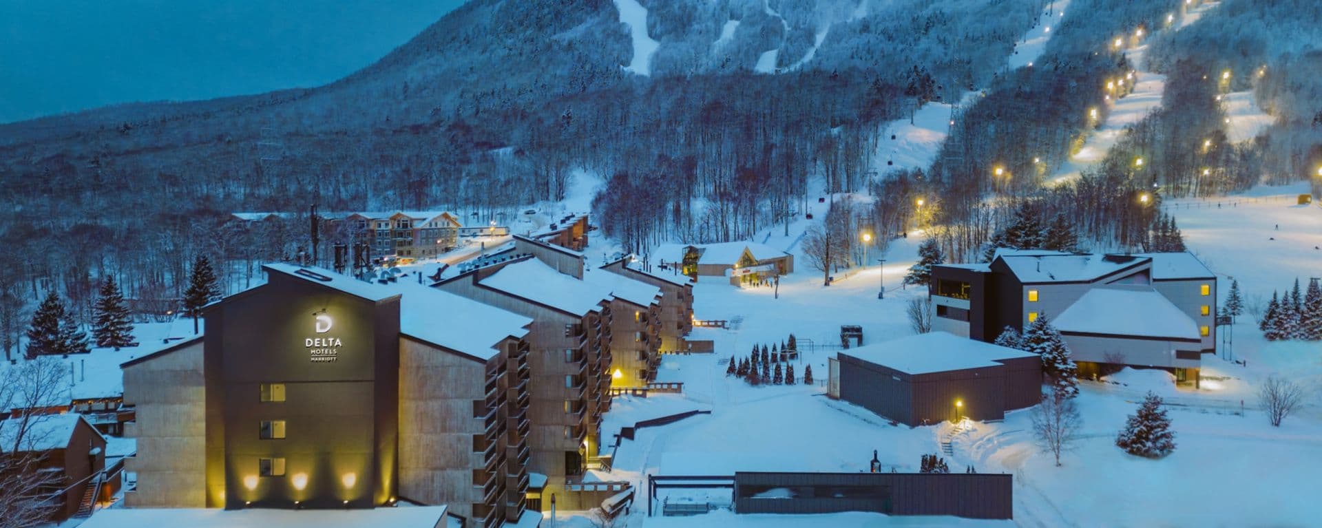 Mont Ste-Marie in Canada: a ski resort in the mountains at night.