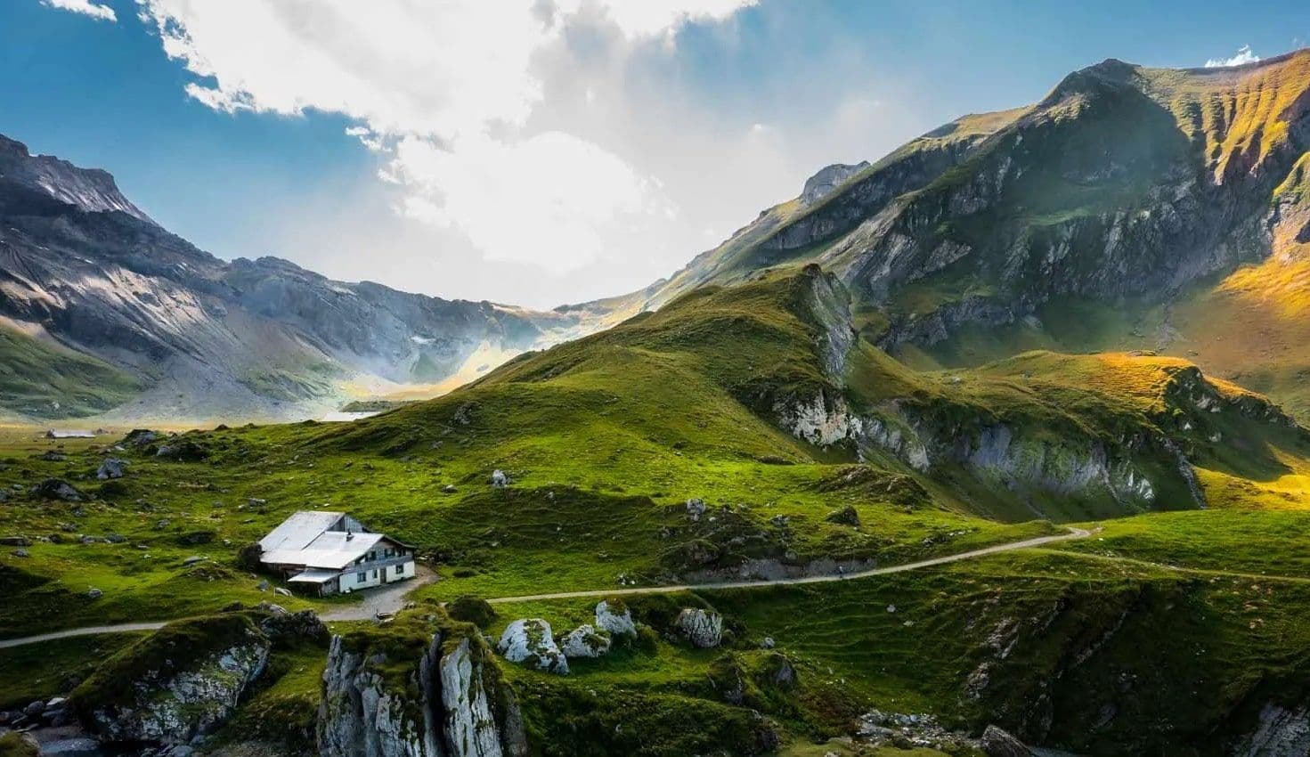 Bergbahnen Engstligenalp AG in Switzerland - a small house in the middle of a mountain valley.