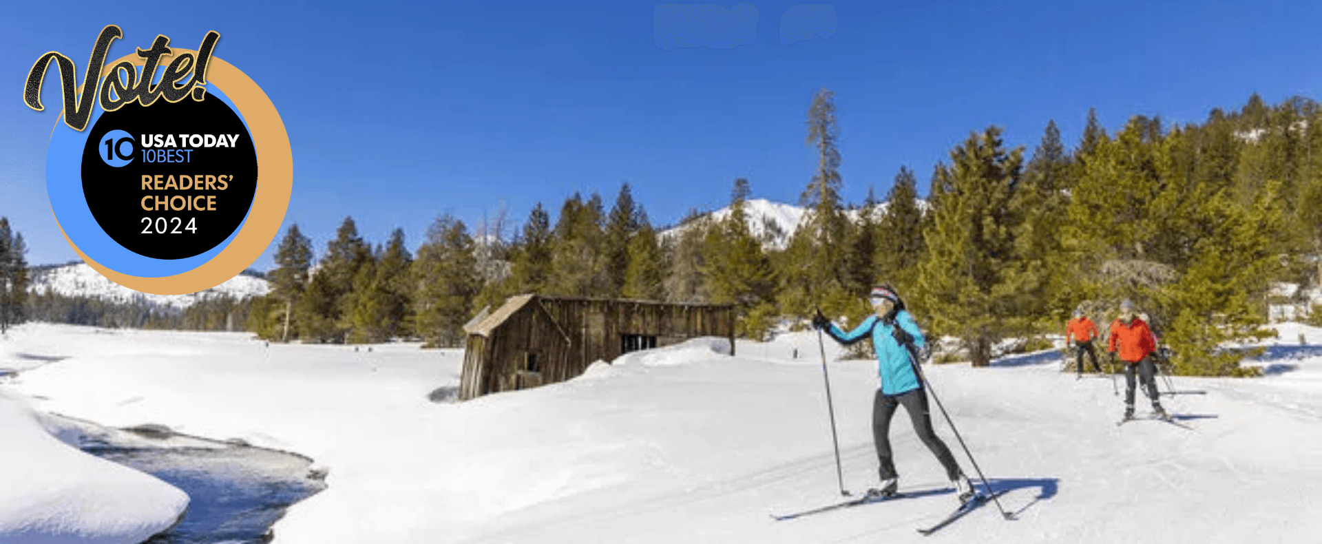 Tahoe Donner in USA - a group of people skiing down a snowy slope.