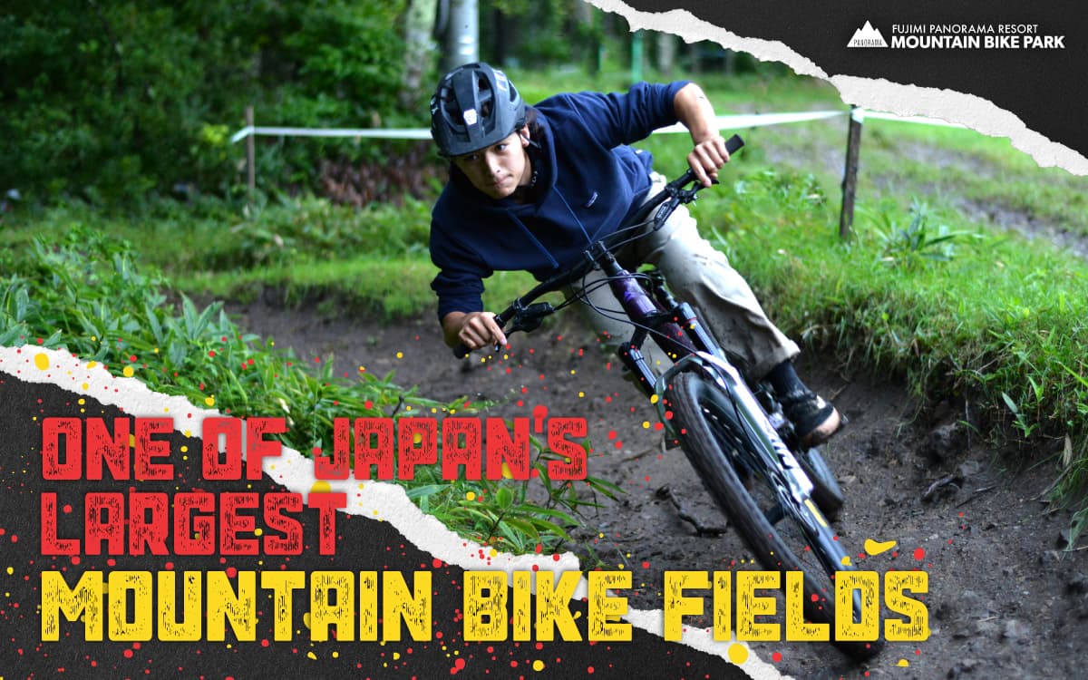 Fujimi Panorama in Japan - a man riding a mountain bike on a trail.