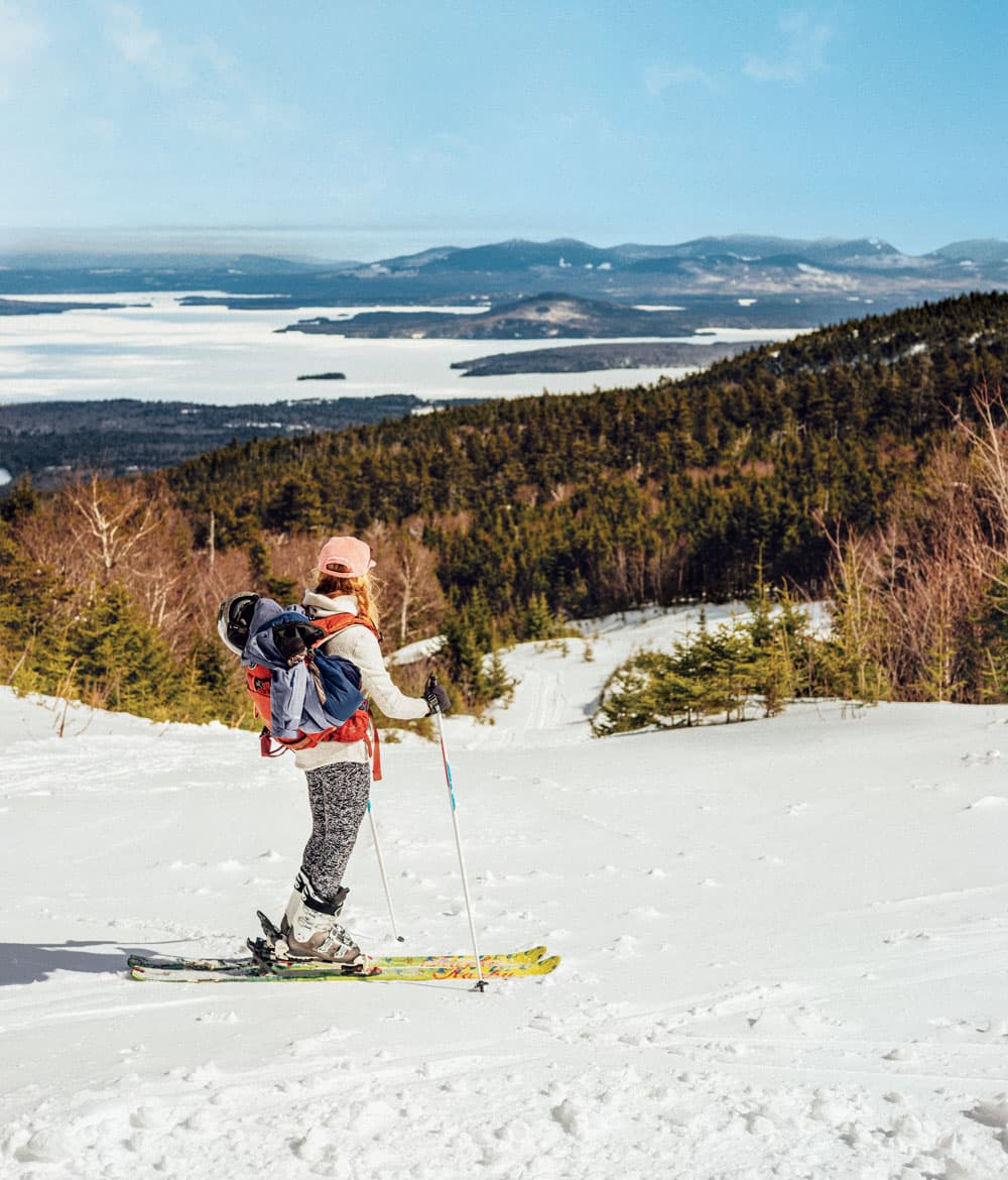 Big Moose Mountain in USA - a person on skis in the snow.
