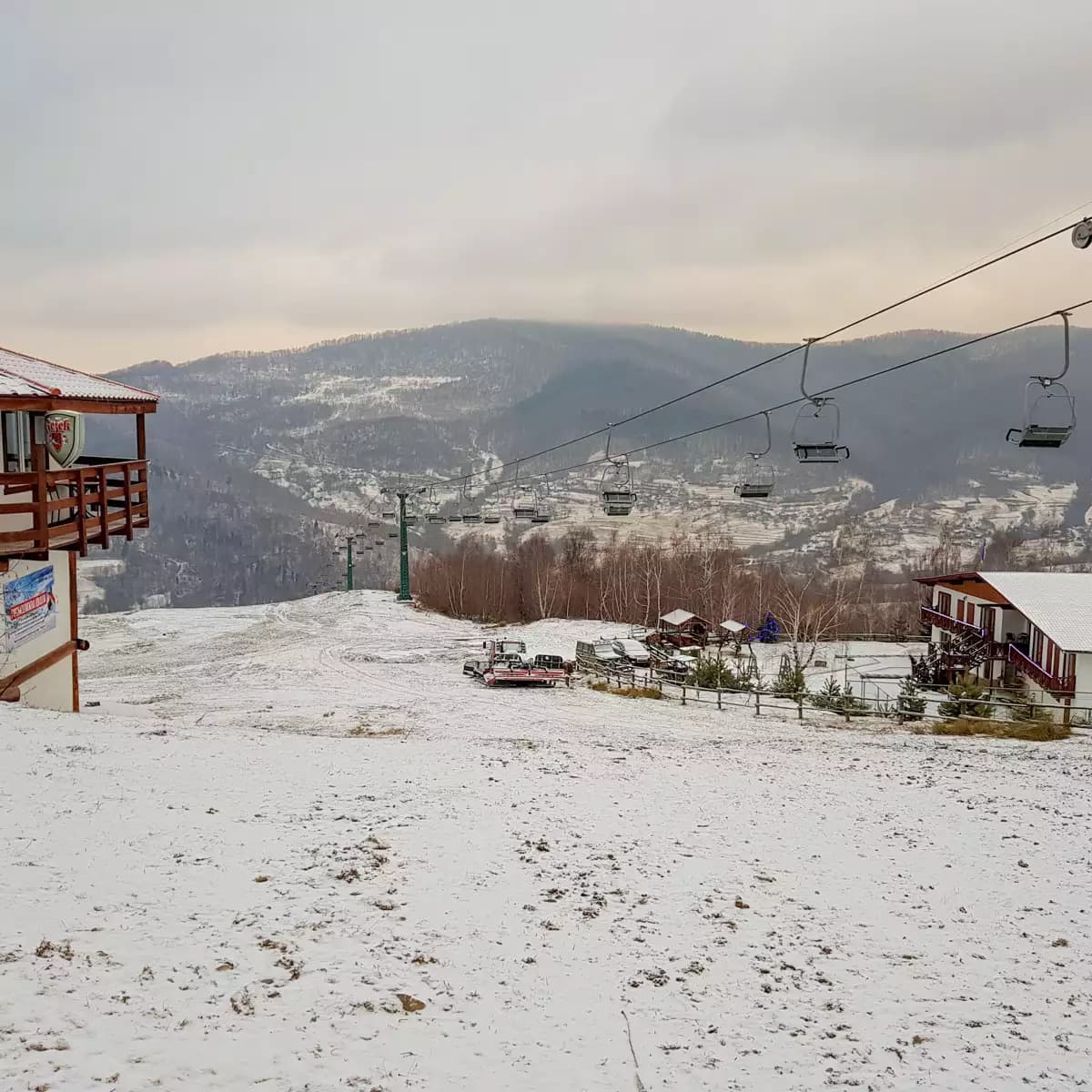 Krasiya in Ukraine - a ski lift going up a snowy hill.