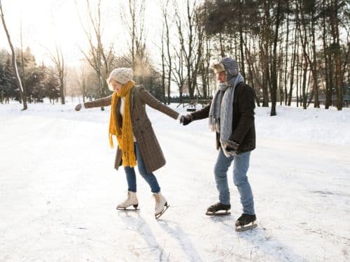 Spring Mountain in USA - a man and woman walking in the snow.