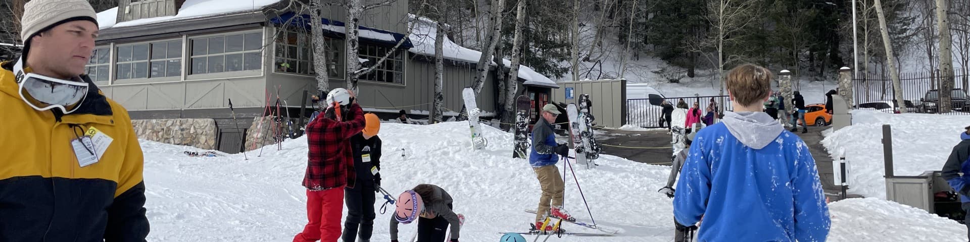 Mt Lemmon Ski Valley in USA - a group of people standing in the snow.
