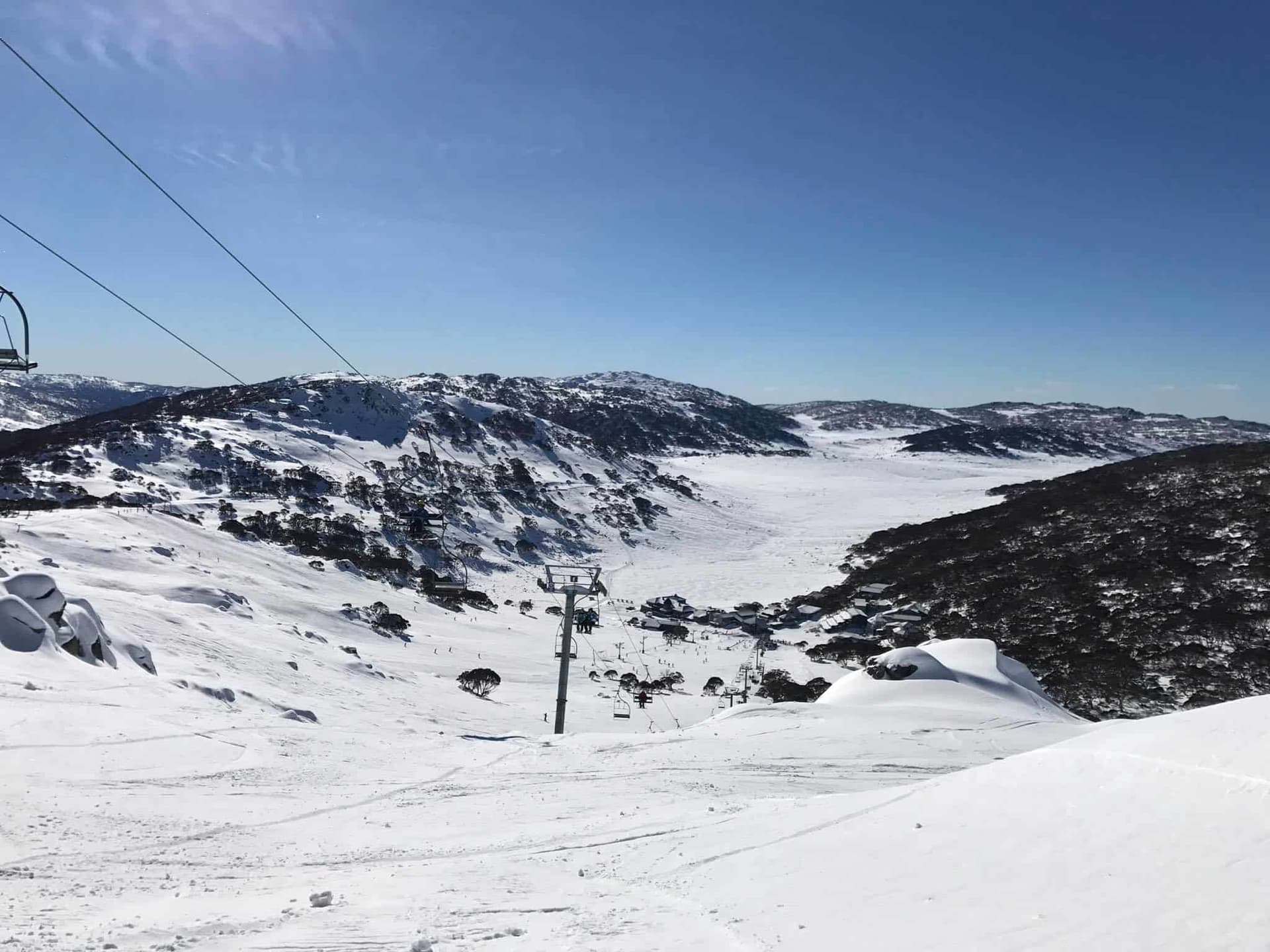 Charlotte Pass in Australia - a ski lift going up a snowy mountain.