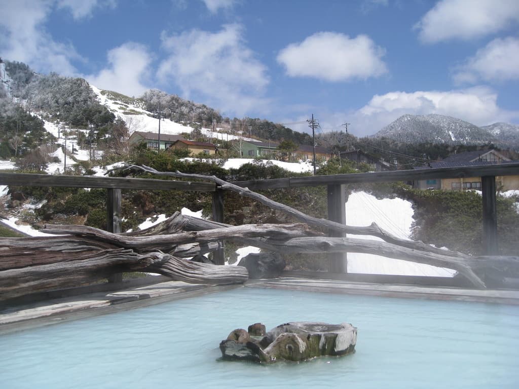 Manza Onsen in Japan - a hot pool in the middle of a mountain.