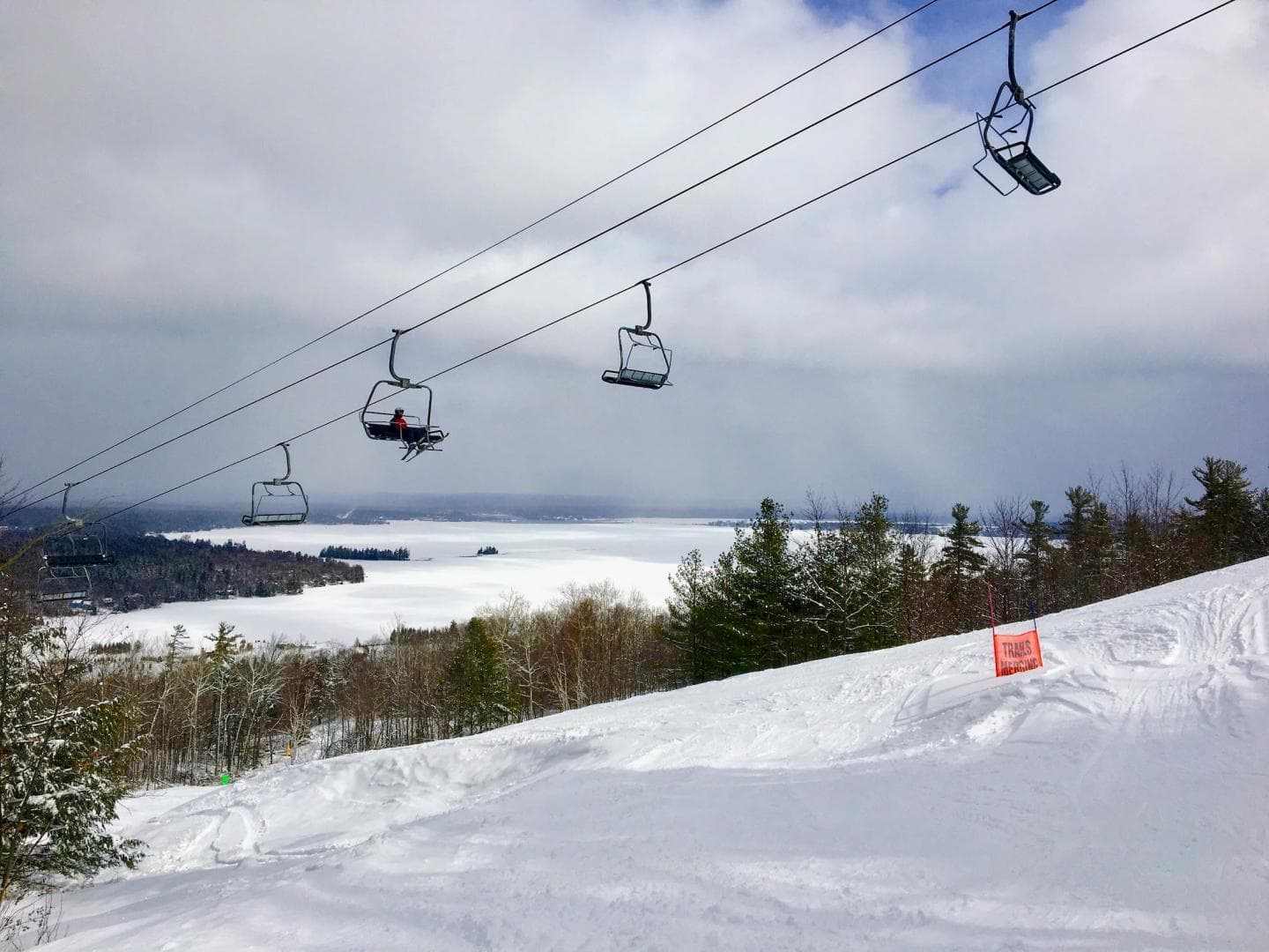 Calabogie Peaks in Canada - a ski lift going up a snowy hill.