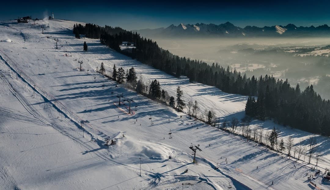 Stacja Narciarska GrapaSki in Poland: an aerial view of a ski resort in the austrian alps.