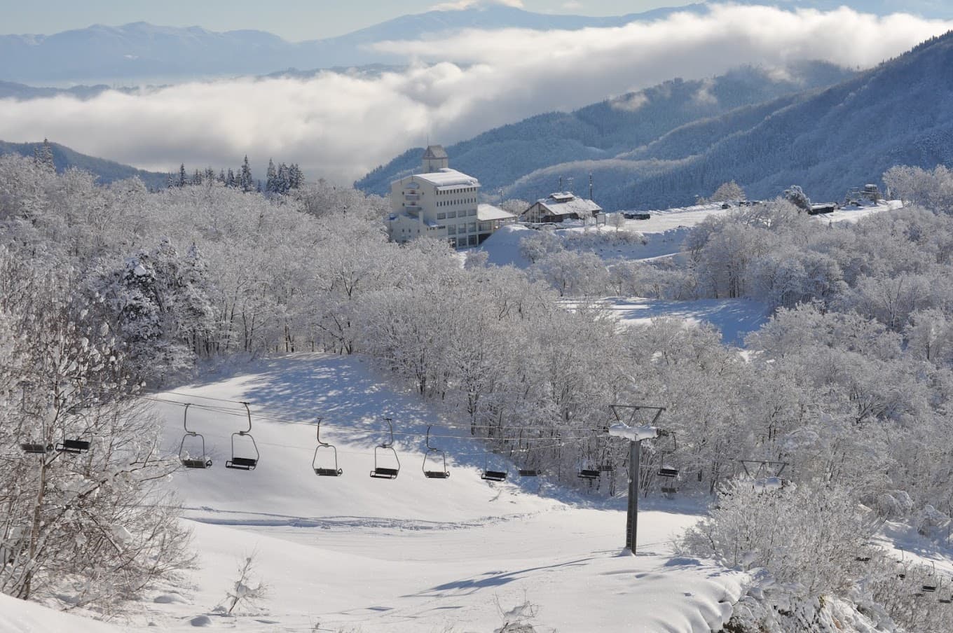 Asahi Shizen in Japan - a snow covered ski slope in the mountains.