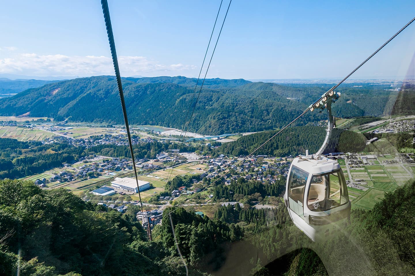 Sky Shishiku in Japan - a view of a city from a cable car.