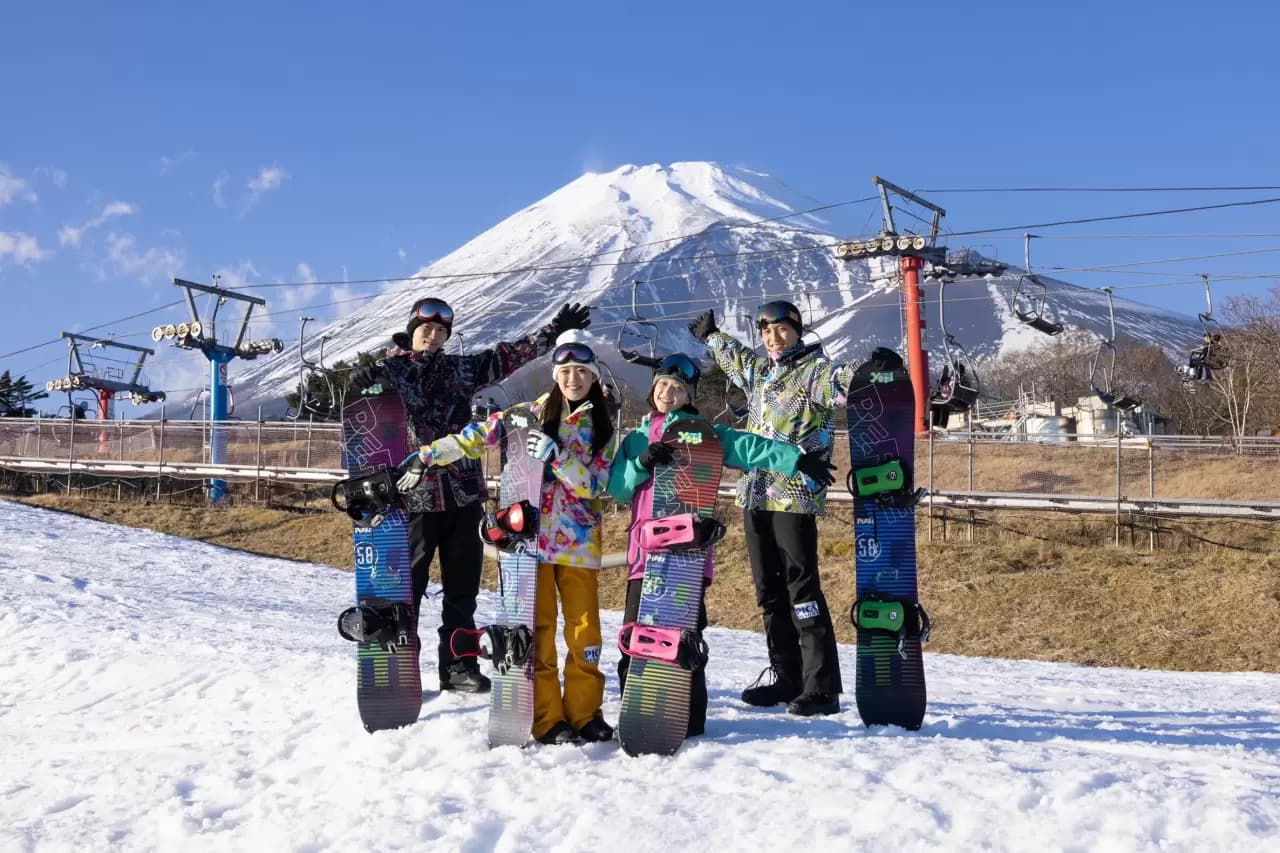Yeti Resort in Japan - a group of people posing for a picture in the snow.