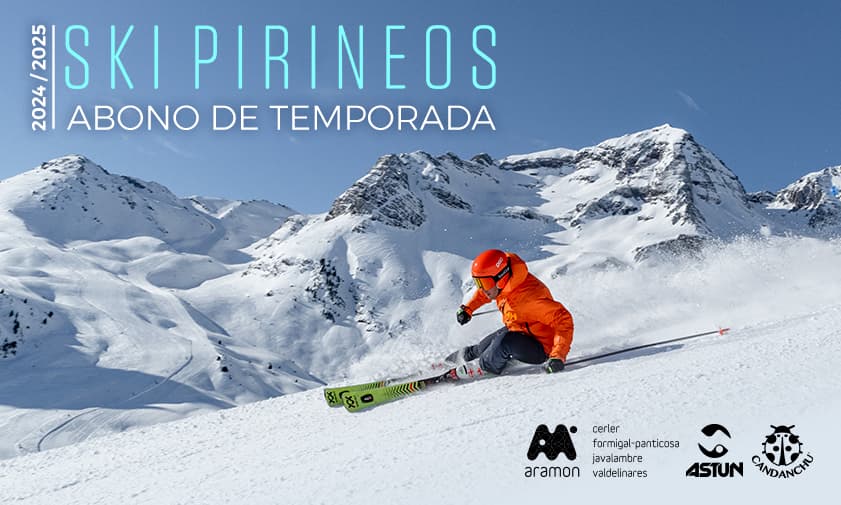 A picturesque scene at Cerler in Huesca Spain featuring a charming chalet various winter sports enthusiasts including skiers and a snowboarder amidst a bustling winter sports centre.