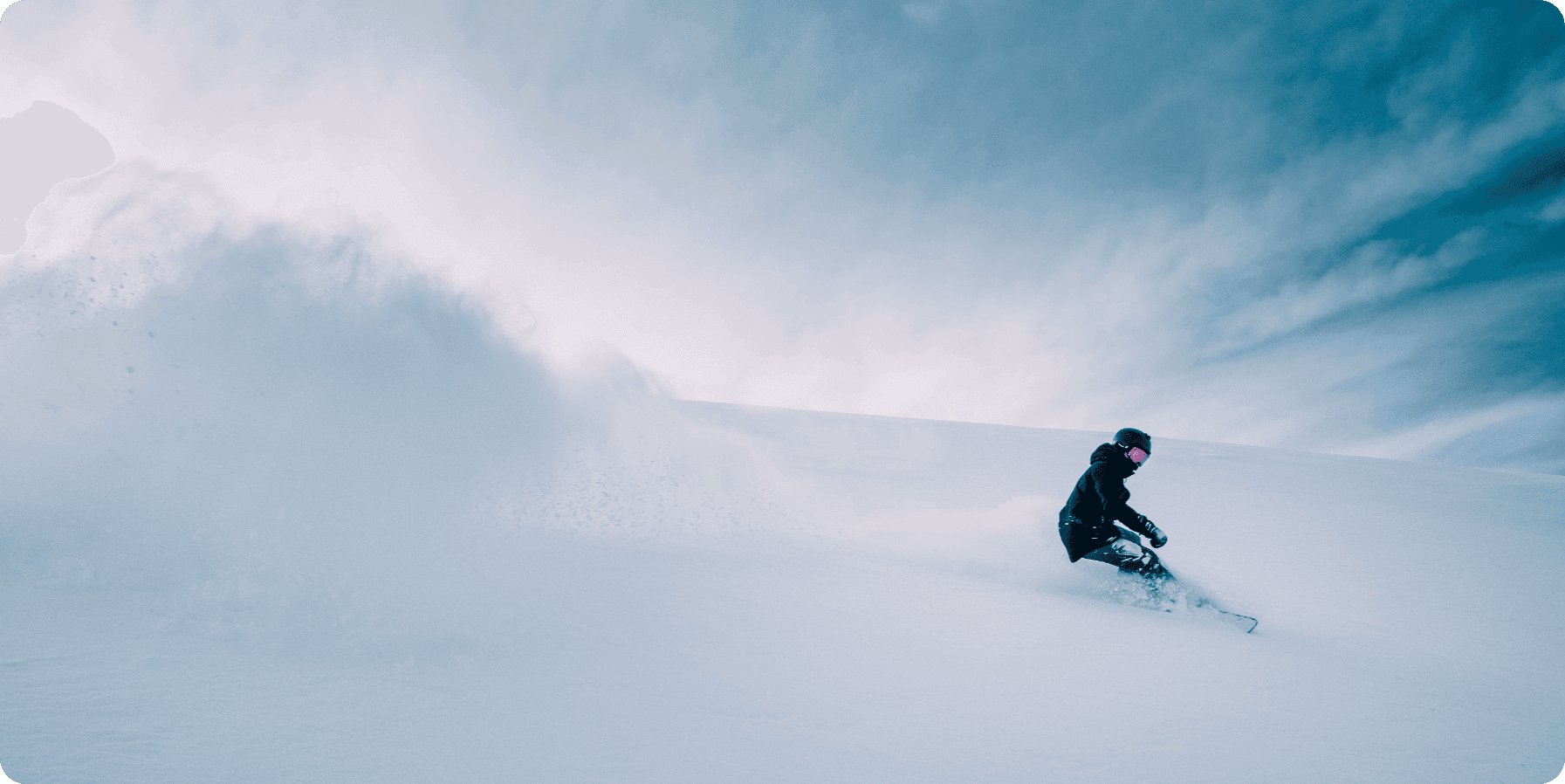A skier enjoying a winter sports scene at Cerler in Aragon Huesca Spain. The background features a chalet nestled among snow-covered slopes. Snowboarders and a snowmobile can be spotted in the distance.