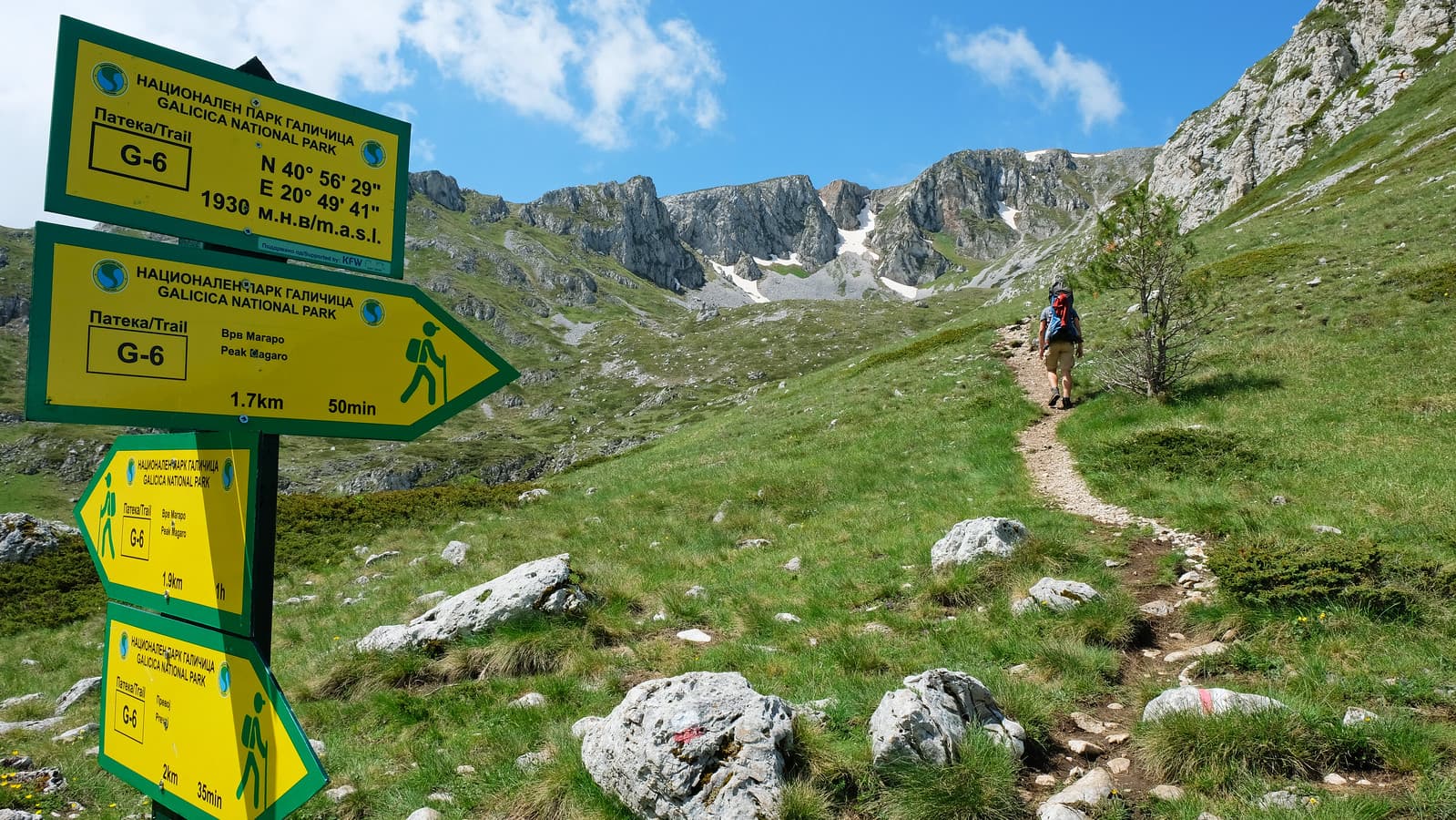 Nizhepole in North Macedonia - a person walking on a trail in the mountains.