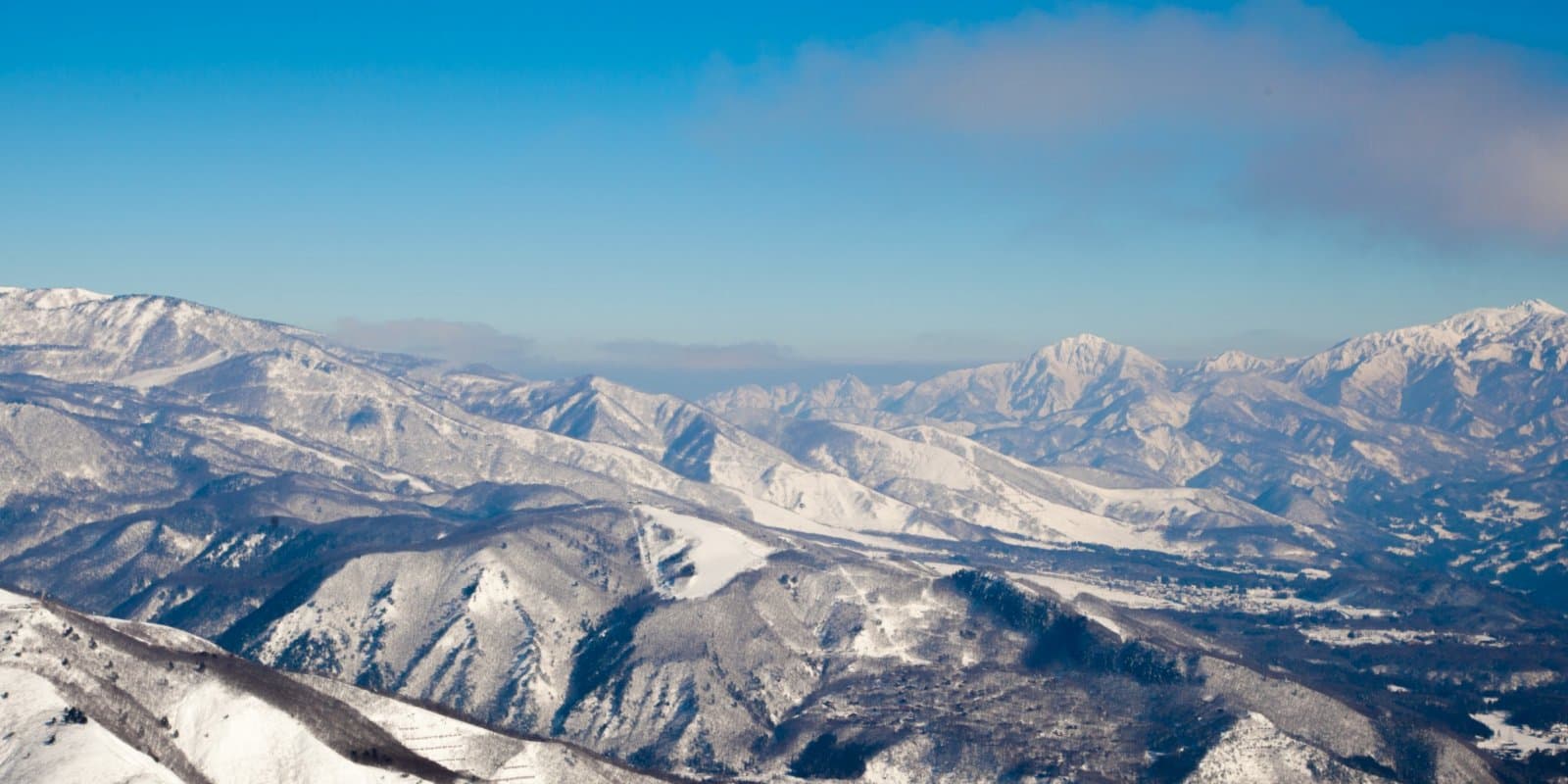 Grandee Hatoriko in Japan - a view of the mountains from the top of a mountain.