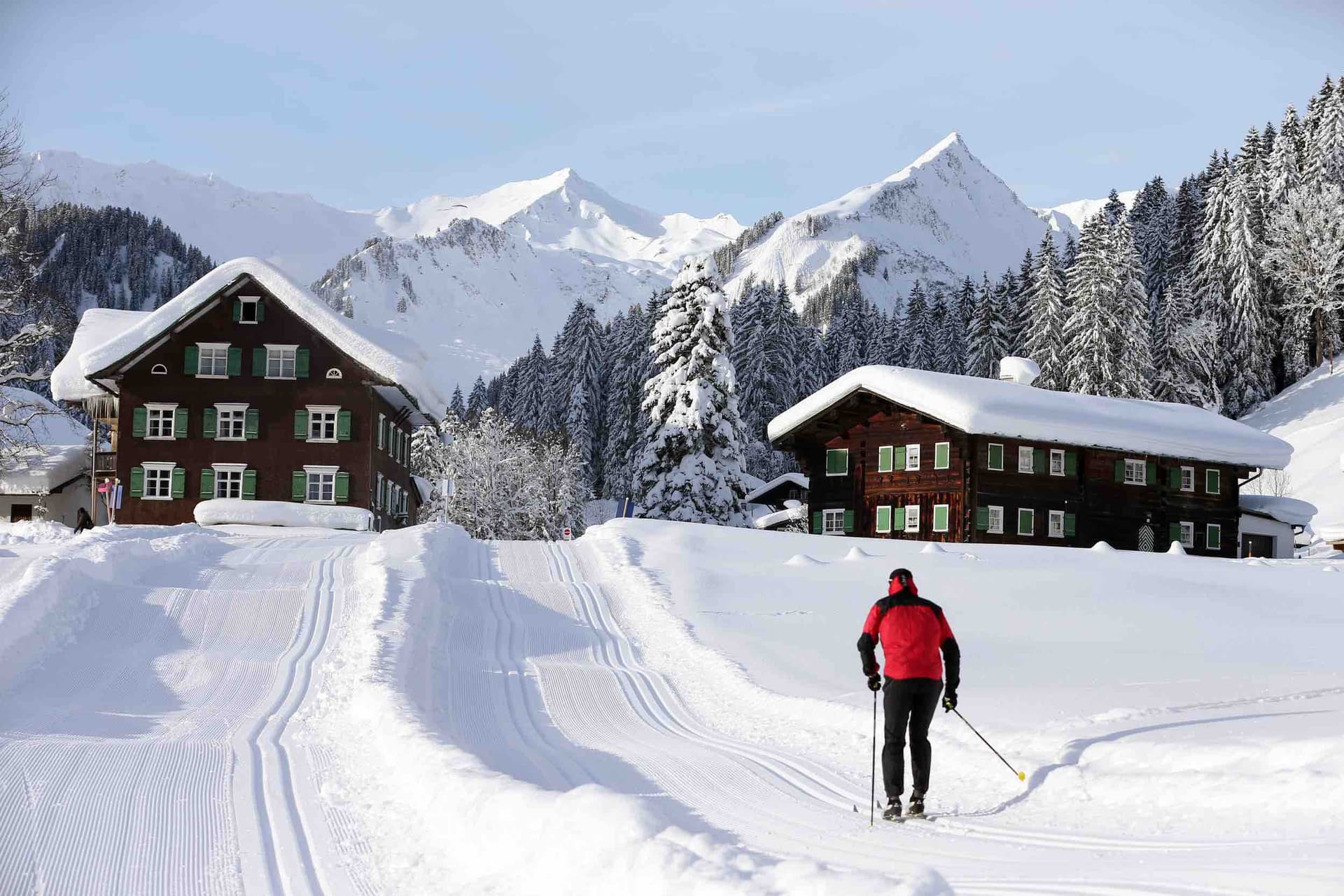 Winter sports enthusiasts enjoying the day at Walmendingerhorn, Heuberg in Mittelberg, Hirschegg, a popular ski resort in Bregenz, Vorarlberg, Austria amidst breathtaking winter scenery.