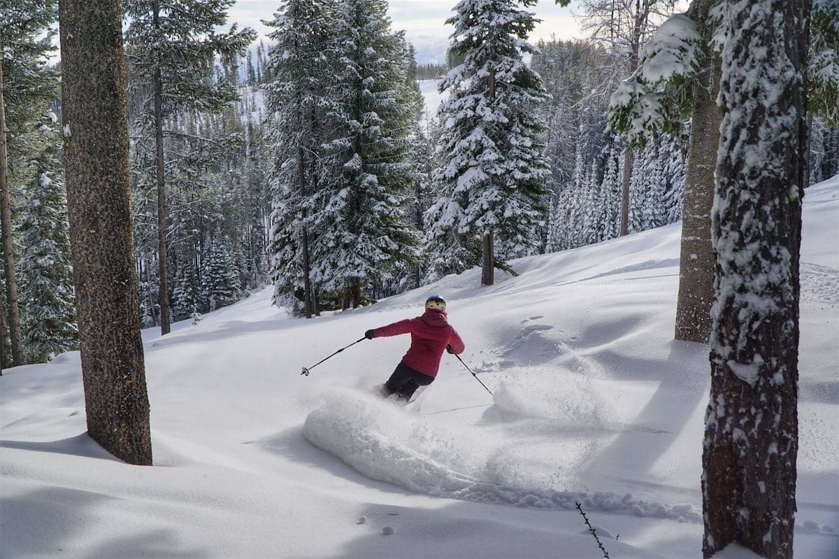 Mont-Blanc QC in Canada - a person skiing down a hill in the snow.