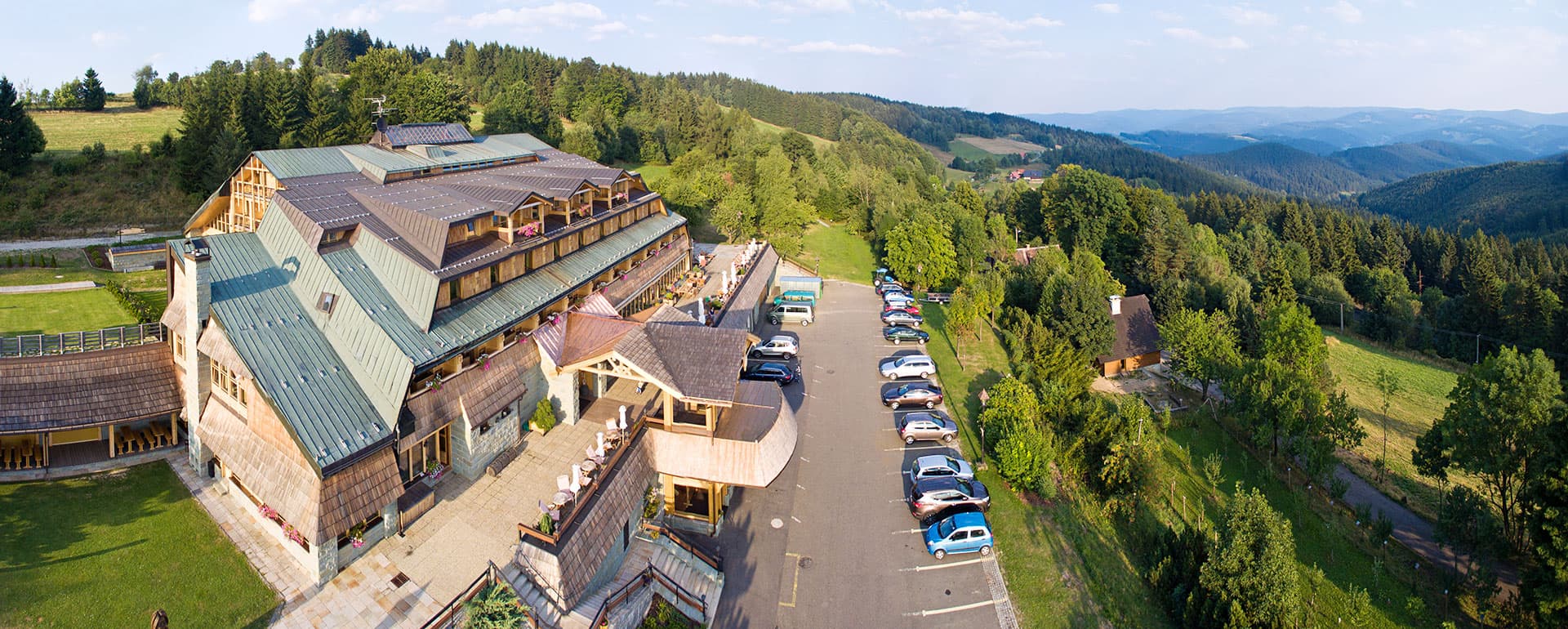 Soláň – Bzové in Czech Republic: an aerial view of a resort in the mountains.