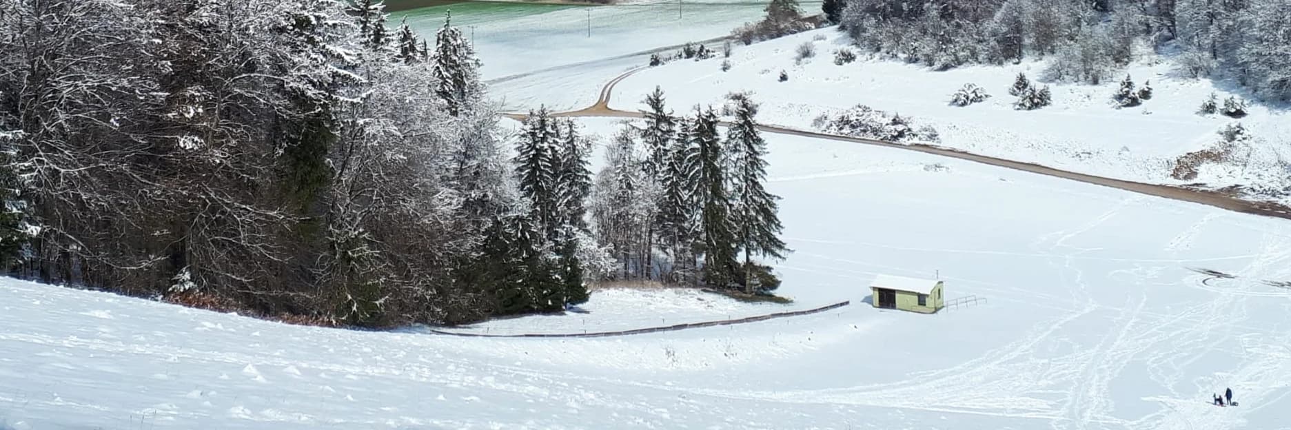 Rieder Weiher – Dollnstein in Germany - an aerial view of a snow covered ski slope.