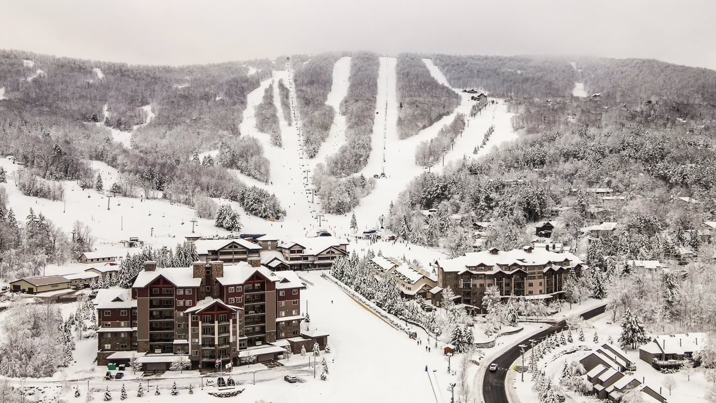 Windham Mountain in USA: a view of a ski resort in the snow.