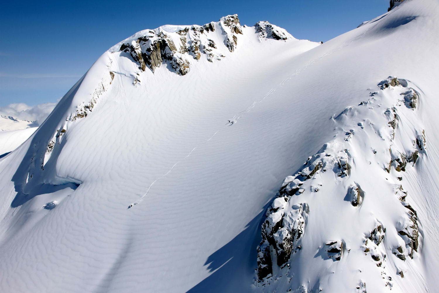 Pantheon in Canada - a person skiing down a snowy mountain.