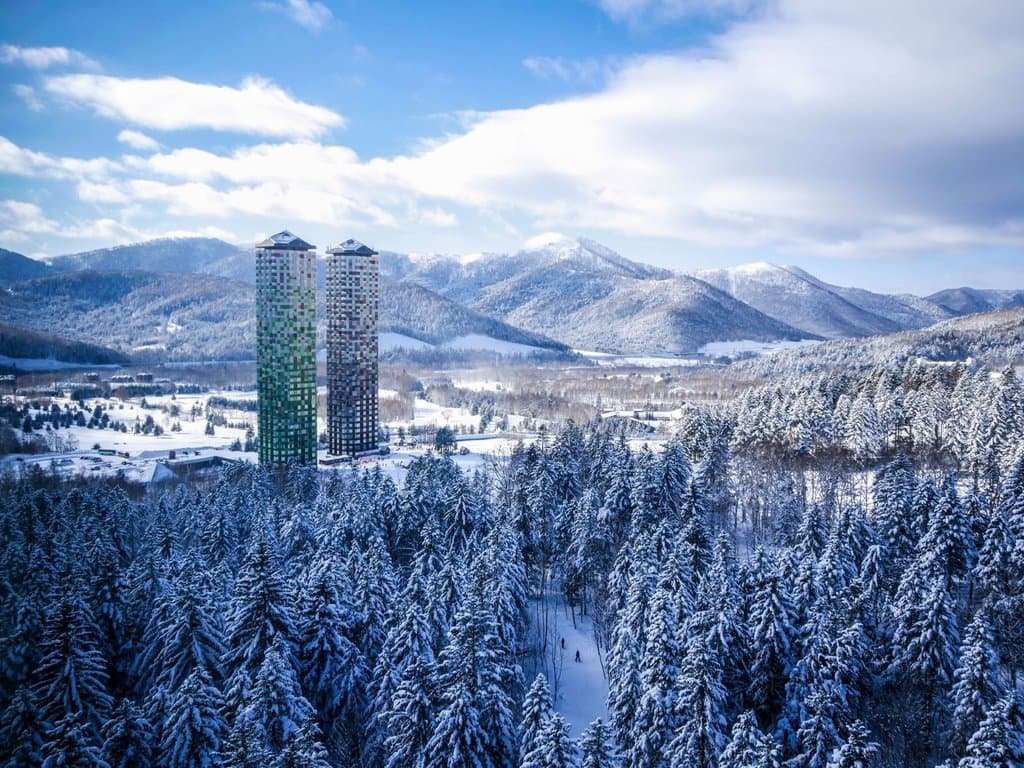 Hoshino Resorts Tomamu in Japan - a view of the mountains from the top of the mountain.