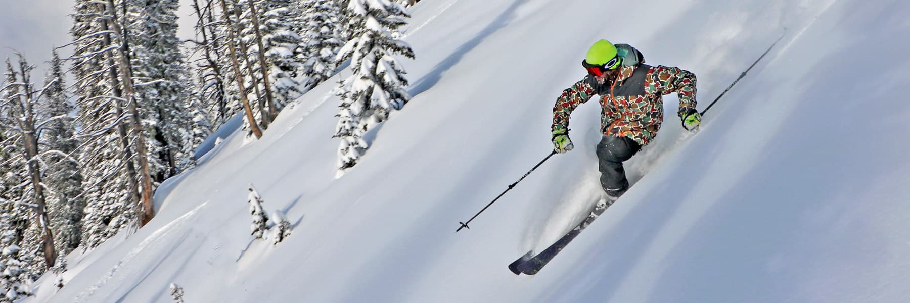 Brundage Mountain in USA - a person skiing down a snowy slope.