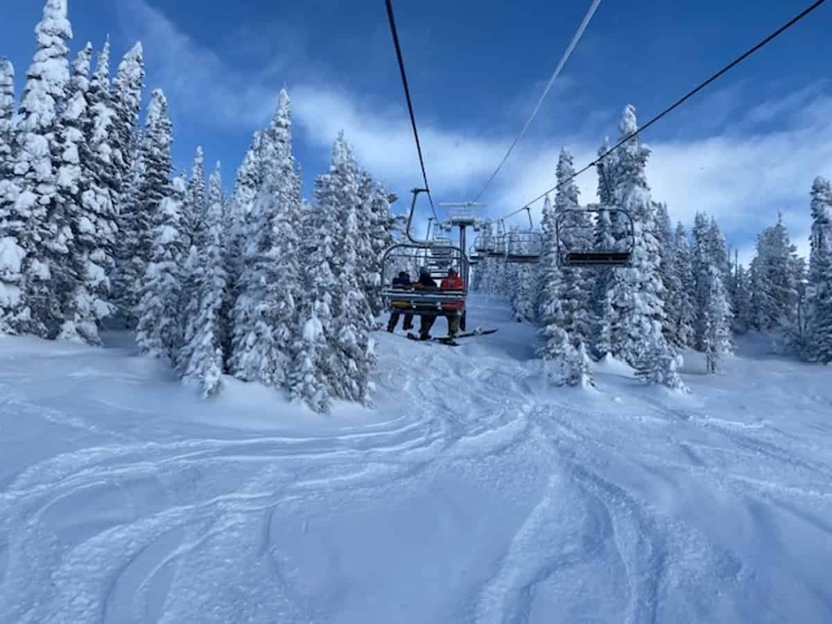 Brundage Mountain in USA - a ski lift going through a snowy forest.