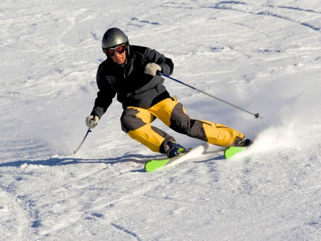 Ski Arena – Aarhus in Denmark - a man riding skis down a snow covered slope.