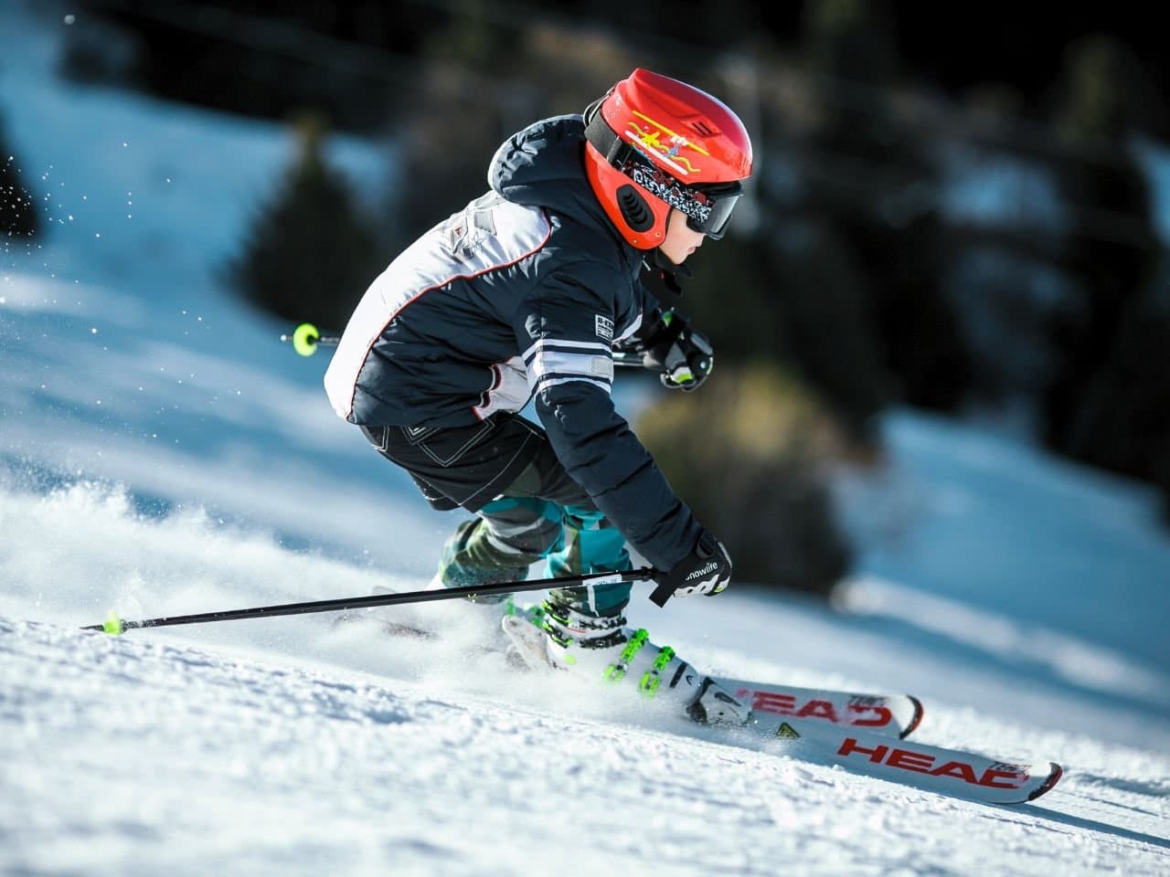 Ski Arena – Aarhus in Denmark - a person riding skis down a snowy slope.