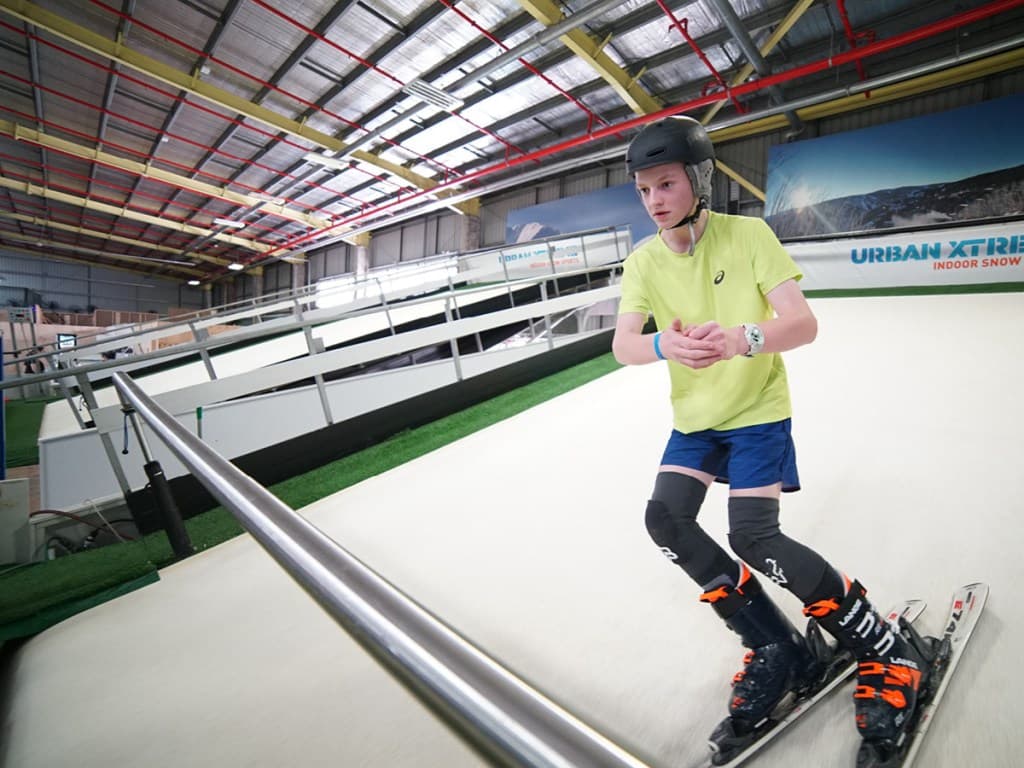 Ski Promotion Deventer in Netherlands - a young boy riding a skateboard down a ramp.