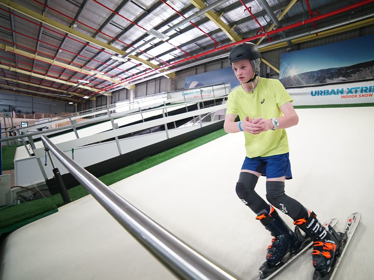 Urban Xtreme – Brisbane in Australia - a young boy riding a skateboard down a ramp.