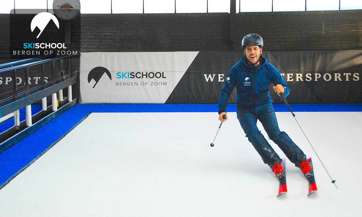 Ego Indoorski – Bergen op Zoom in Netherlands - a boy in a blue jacket skiing down a slope.