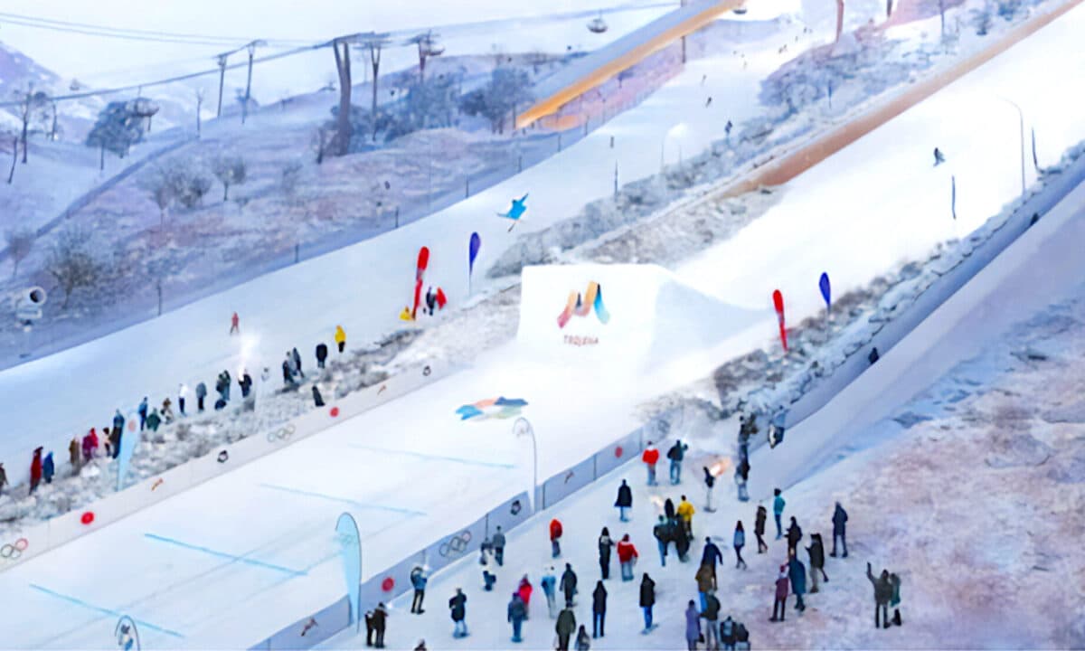 Snow51 X adidas Terrex – Shanghai in China - a group of people skiing down a hill.