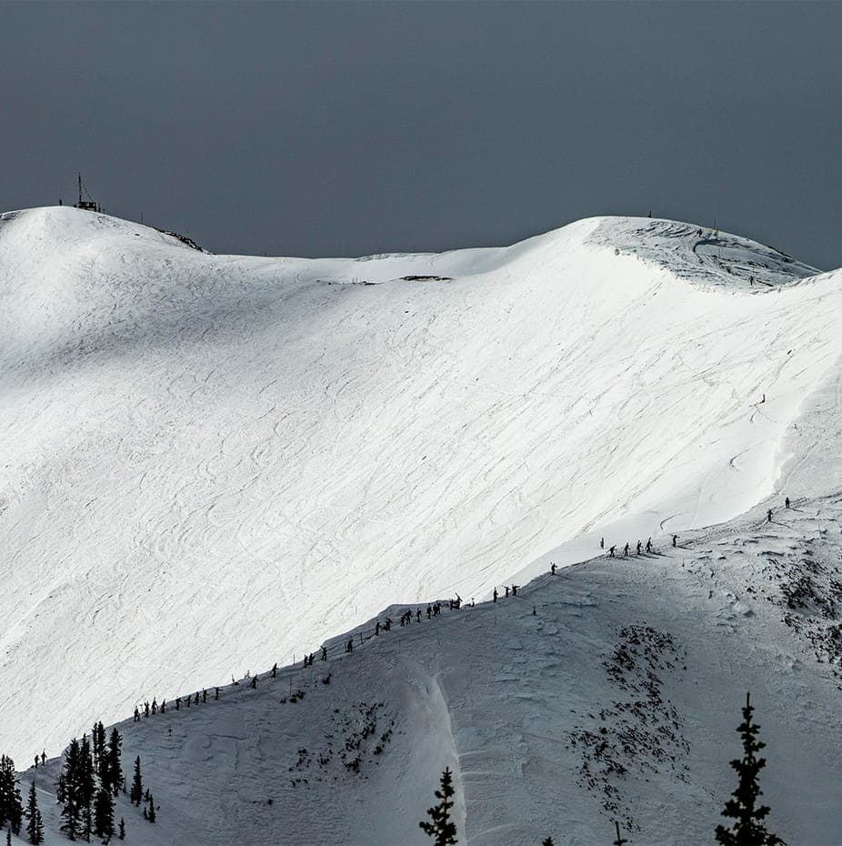 Highland Powder Cat Skiing in Canada - a large mountain covered in snow.