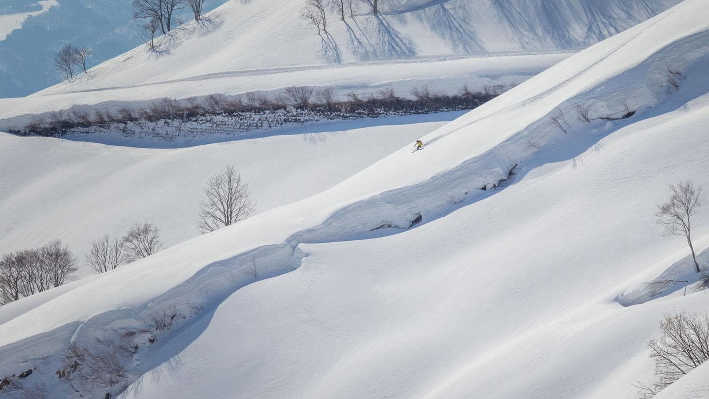 Lotte Arai Resort in Japan - a person skiing down a snowy slope.