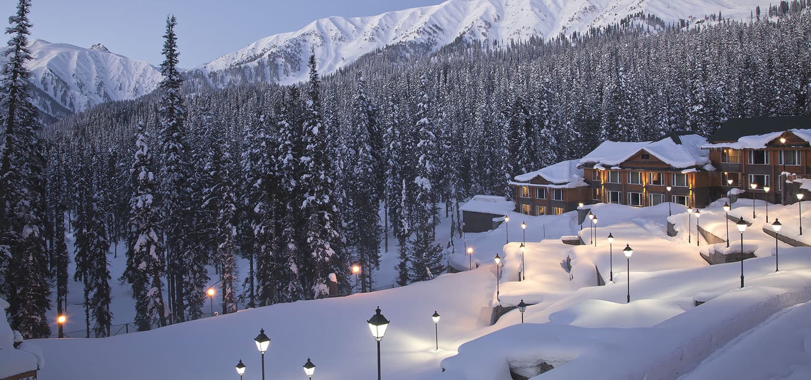 Pahalgam in India - a house in the middle of a snowy forest.