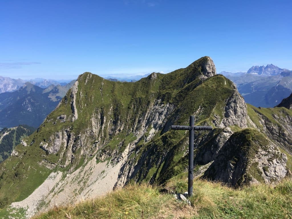 Roc d'Enfer in France - a cross on the top of a mountain.