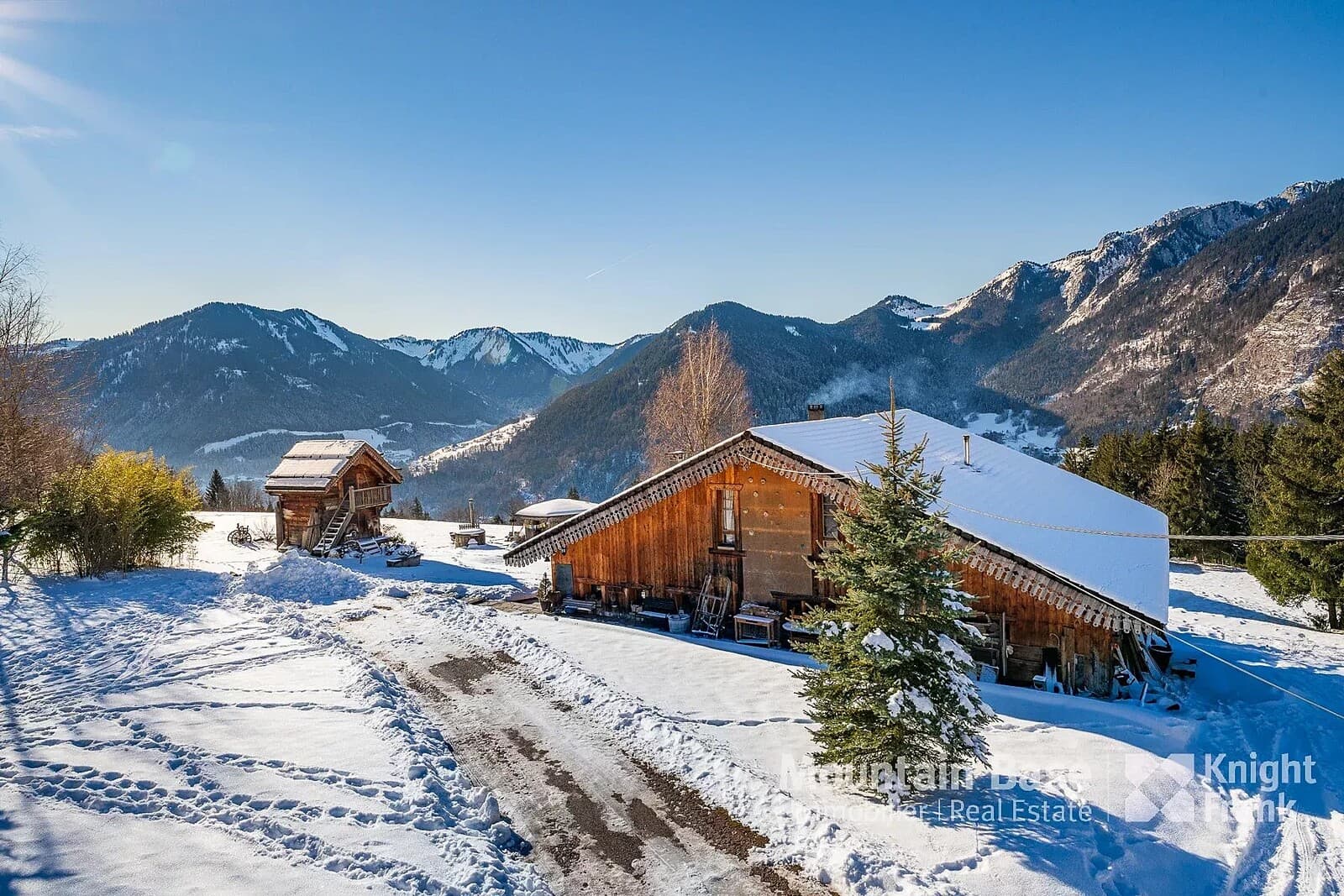 Roc d'Enfer in France - a house in the mountains with snow on the ground.