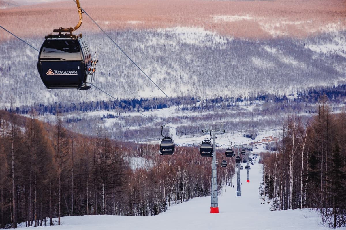 Kholdomi in Russia - a ski lift going up the mountain.