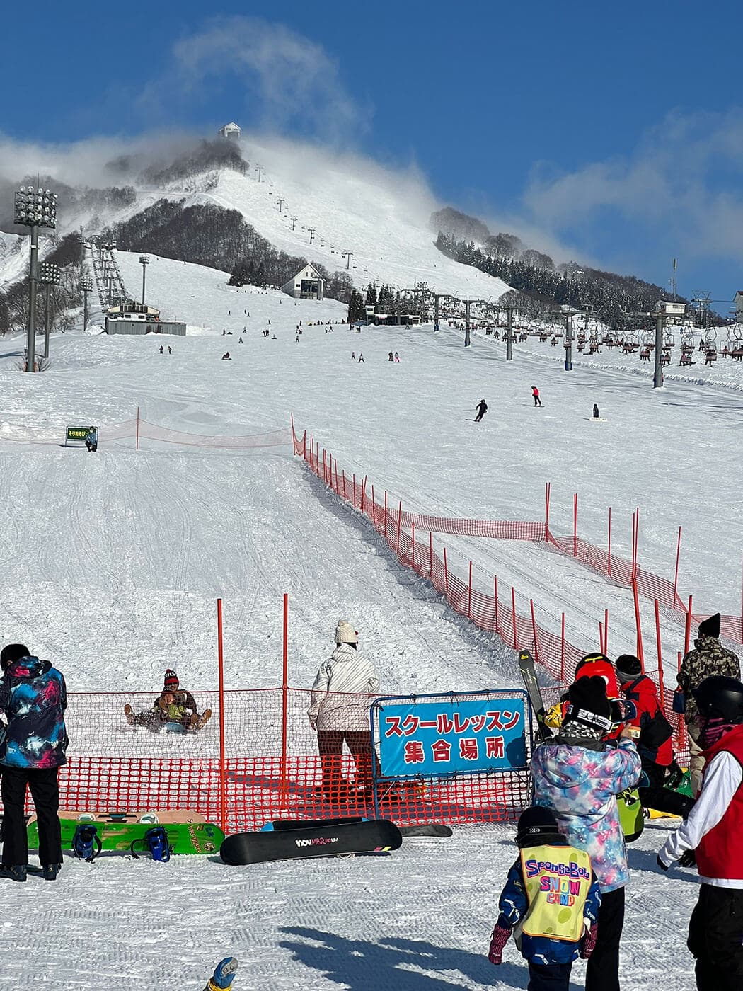 Iwappara in Japan - a group of people standing on a snowy slope.