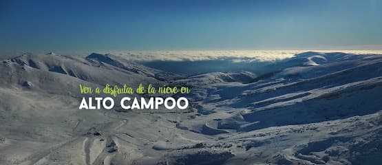 A picturesque chalet nestled in the heart of Alto Campoo ski resort in Cantabria, Spain, surrounded by a stunning winter landscape bustling with winter sports activities.