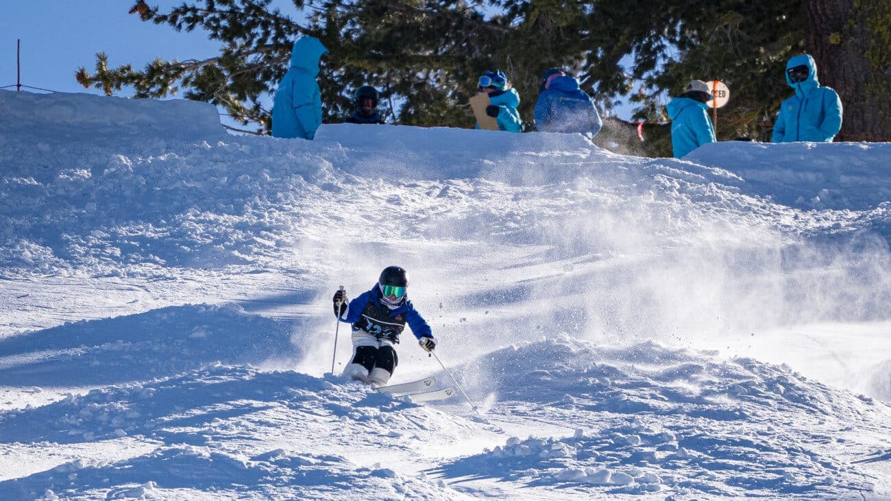 Palisades Tahoe in USA - a person riding a snowboard down a hill.